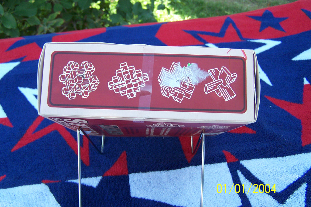 Brain Busting Puzzles: 4 Classic Wooden Puzzles